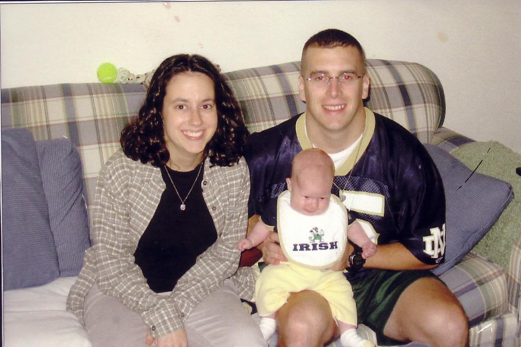 Ian Palmer, his wife, and their two-week-old daughter at home in the late summer of 2001